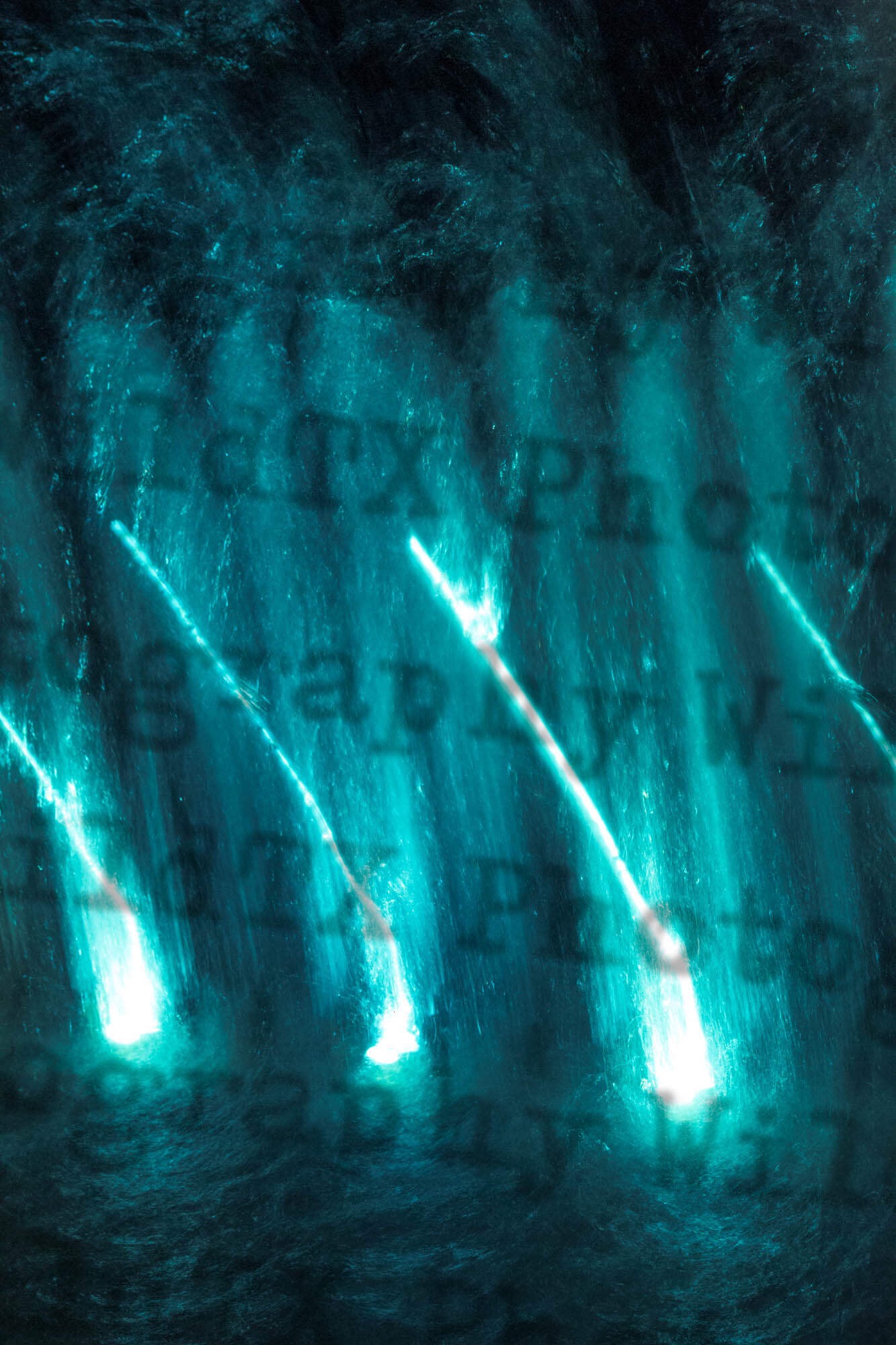 Abstract teal and cyan light streaks with motion blur and bokeh effect